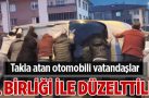 Takla atan aracı mahalle sakinleri bir araya gelerek düzeltti